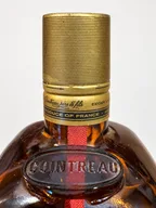 Cointreau — cropped neck and shoulder (B0035)